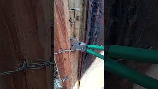 This is how to tension wire fence using fencing pliers #fencing #pliers #fencingwork #shorts