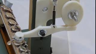 Flute pad testing machine