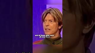 David Bowie talks about his band wearing make-up and costumes for the shows