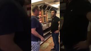 Birmingham, West Midlands (UK). Kebab house workers defend themselves against abusive customer.