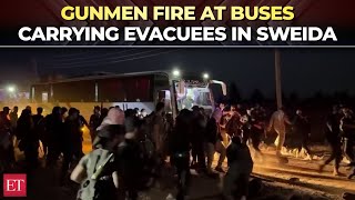 Syria crisis: Chaotic scene in Sweida as armed men open fire on evacuation efforts