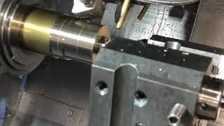 CNC TURNING MACHINE WITHE DUAL TURRET WORKING. AND USE U-DRILL BORING PURPUS