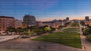 Panorama showing lawn at Alameda Dom Afonso Henriques and the Luminous Fountain aerial day to night