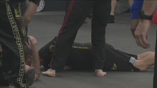 Dozens gather to learn Krav Maga, a type of self-defense