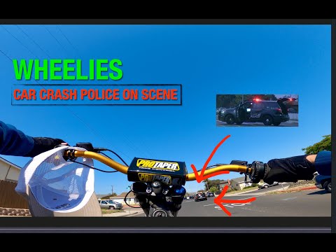 SurRon investigates CAR CRASH! #Wheelies