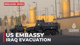 US Iraq evacuation: Embassy staff ordered to leave amid security risks