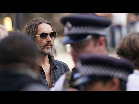 Russell Brand granted conditional bail after appearing in London court on rape and assault charges