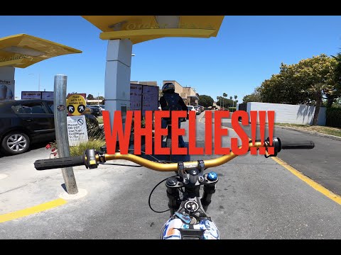 E-BIKE VS McDonald's + wheelies!