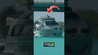 Yacht crew rushes to lower antenna to clear the Haulover Bridge | Wavy Boats