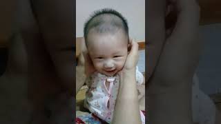 Grandmum loves baby's cheeks