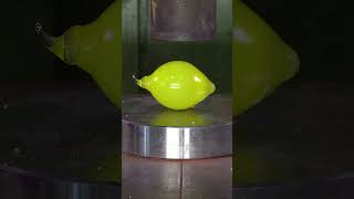 Crushing marble balls with 150 ton Hydraulic Press