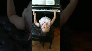 Tianhui@8 is practicing Mozart sonata