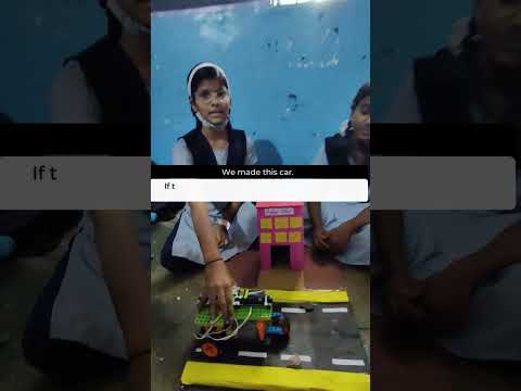 Girl build their 1st Robot using a sensor to protect vehicle from damage. #RoboticProject