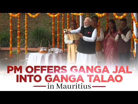 PM Modi offers Ganga Jal into Ganga Talao in Mauritius