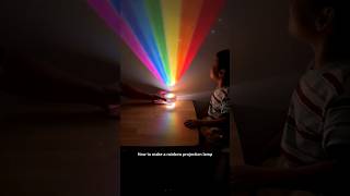 Use wide scotch tape and markers to make a rainbow projection lamp for your child! #parentchild