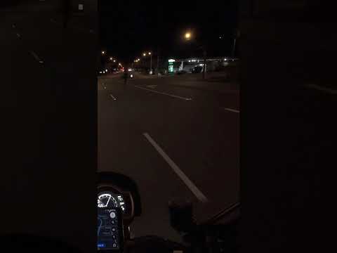 Triumph Scrambler 1200XE Overtaken By Electric Scooter