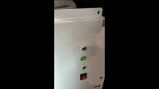 How to adjust temperature of cooling system at water dispenser