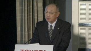 Floods and strong yen sink Toyota's profits