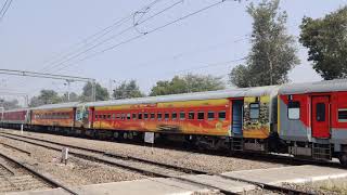 12403/Prayagraj - Jaipur SF Express - departing Alwar junction, with an electri loco