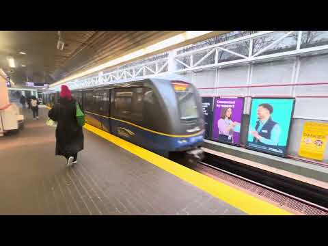 2 Expo Line trains at Stadium-Chinatown Station