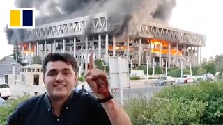 Watch moment Iran state TV live broadcast interrupted by Israeli air strike