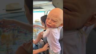 Baby head freaks her out