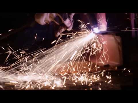 Golden Gate Bridge Handrail - Rick Bulan cutting up a section of historic handrail.
