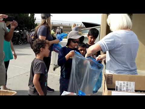 Harrison Family Helping Otter Outreach with Beach Clean Up