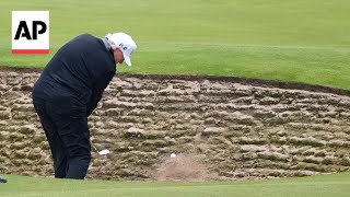 Trump plays golf at his course in Turnberry, Scotland
