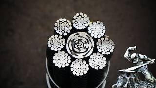Damascus steel from rope. Steel flowers on the blade.