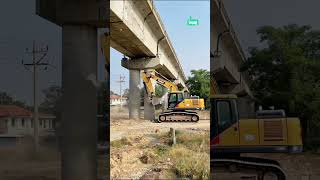 "Excavator Machine Breaking Down Historic Bridge"