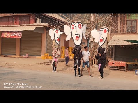 ຜີຕະໂຂນອອກເລາະເມືອງປາກລາຍ#ผีตะโขนป่วนเมืองปากลาย# Peetakone festival 📌Laos🇱🇦