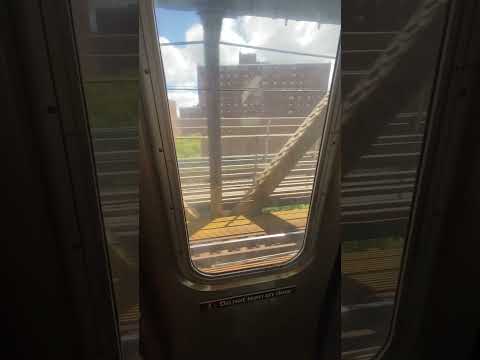 (D) Train Ride On Manhattan Bridge