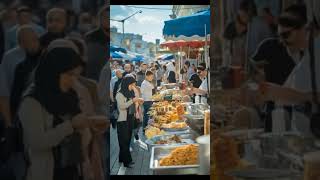 The cat is buying takjil at the Ramadhan bazaar #shorts #ramadhankareem #ramadhan #ai #aicat