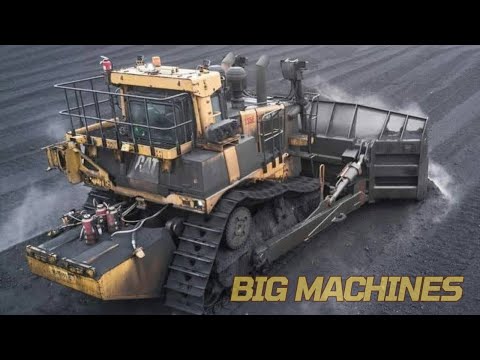 Awesome Heavy Construction Mining Equipment in Action Building Road for Haul Trucks With Bulldozer